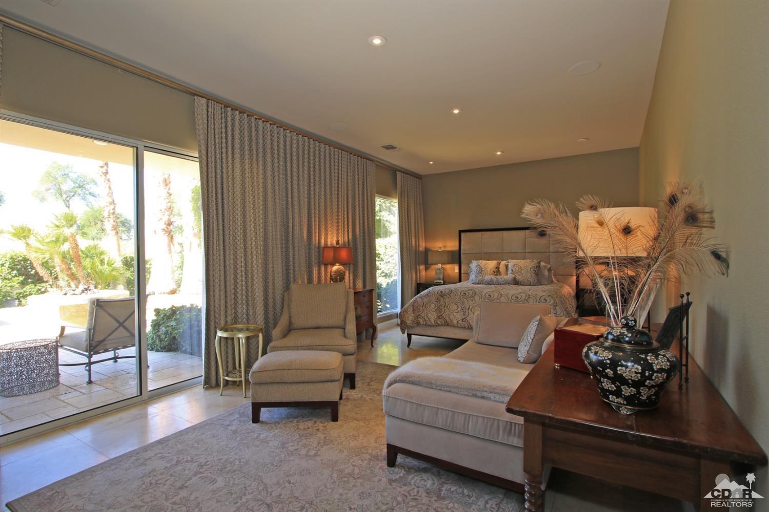204 Loch Lomond Road Rancho Mirage, CA 92270 - Photo 20 of 45 a bedroom with furniture and a couch