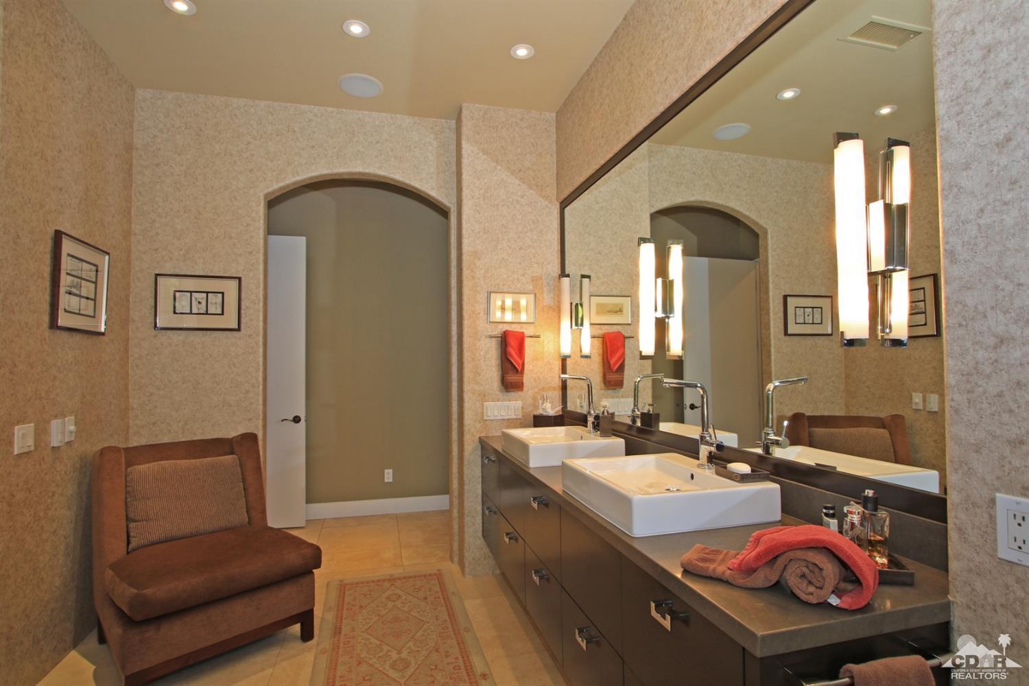 204 Loch Lomond Road Rancho Mirage, CA 92270 - Photo 25 of 45 a bathroom with a sink and a mirror