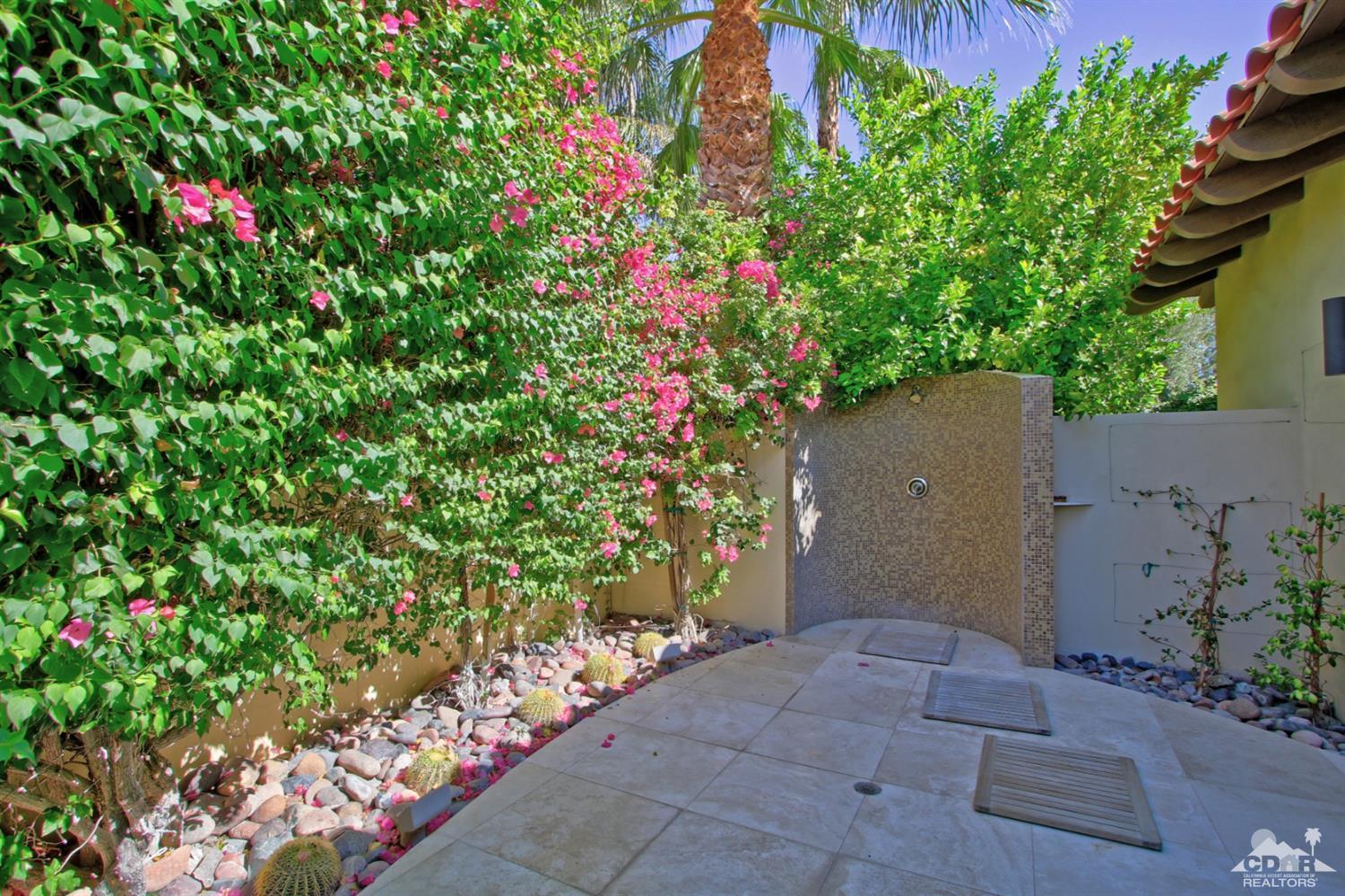 204 Loch Lomond Road Rancho Mirage, CA 92270 - Photo 26 of 45 a backyard of a house with lots of green space