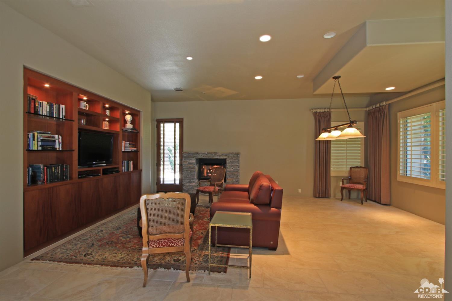 204 Loch Lomond Road Rancho Mirage, CA 92270 - Photo 28 of 45 a dining room with furniture and window
