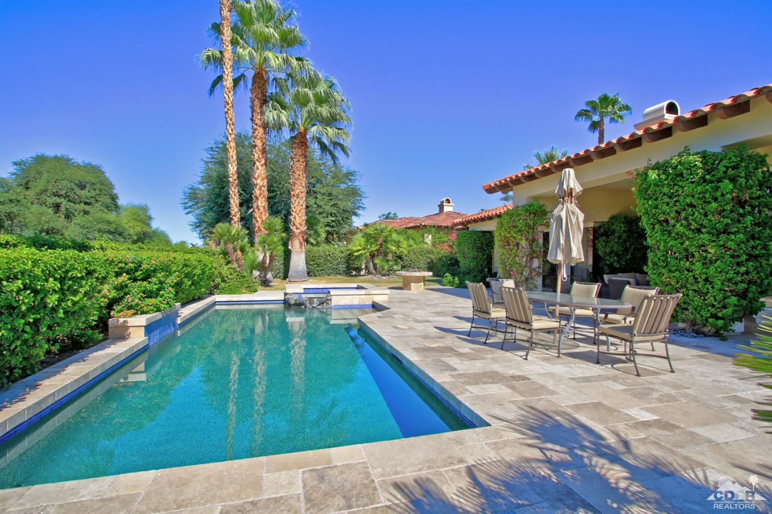 204 Loch Lomond Road Rancho Mirage, CA 92270 - Photo 40 of 45 a view of a patio with swimming pool
