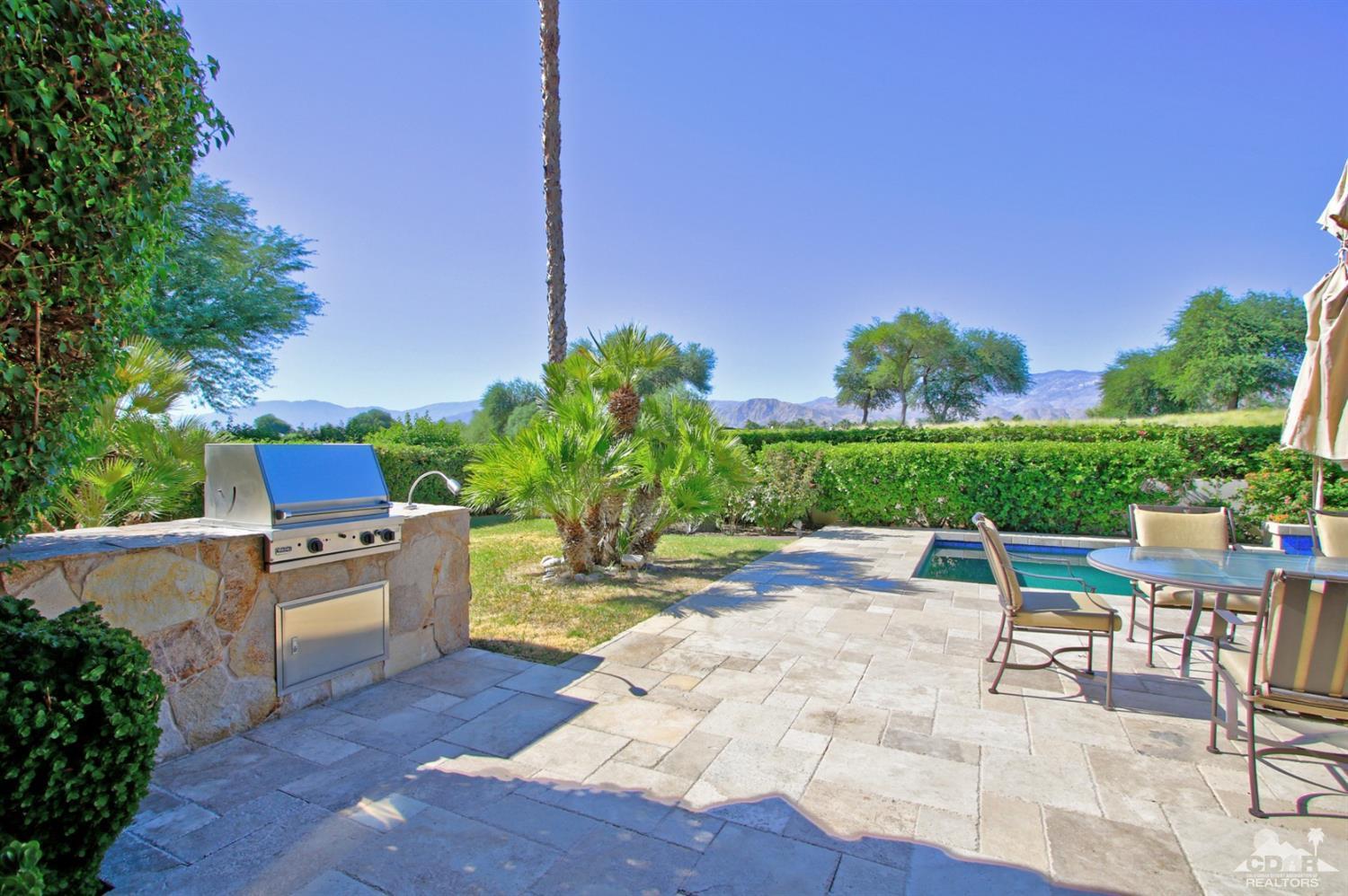 204 Loch Lomond Road Rancho Mirage, CA 92270 - Photo 43 of 45 a view of a backyard with sitting area