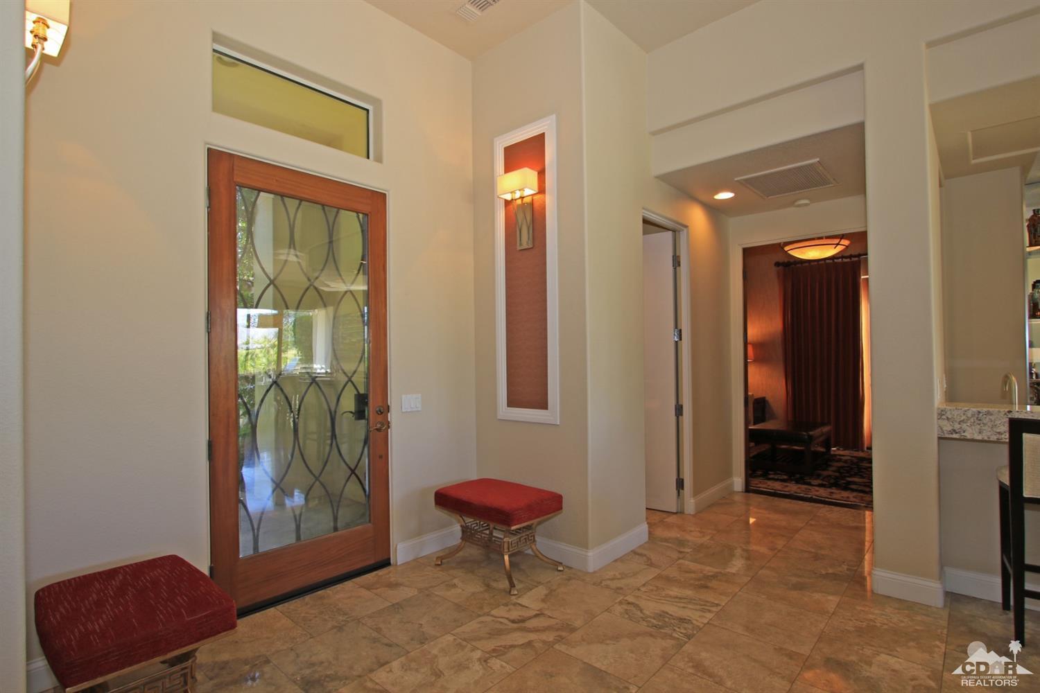 204 Loch Lomond Road Rancho Mirage, CA 92270 - Photo 7 of 45 a living room with furniture and a window
