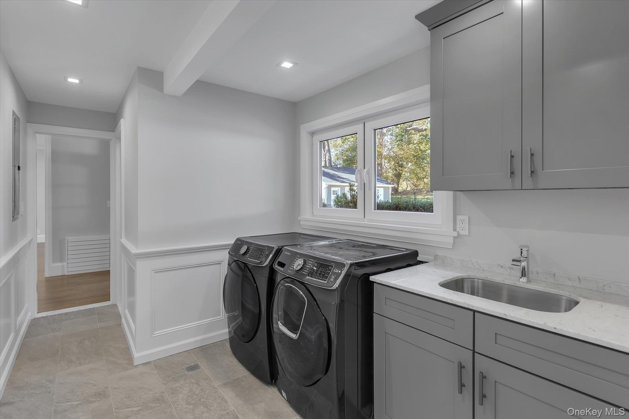 22 Fort Salonga Road Centerport, NY 11721 - Photo 19 of 42 a utility room with sink dryer and washer
