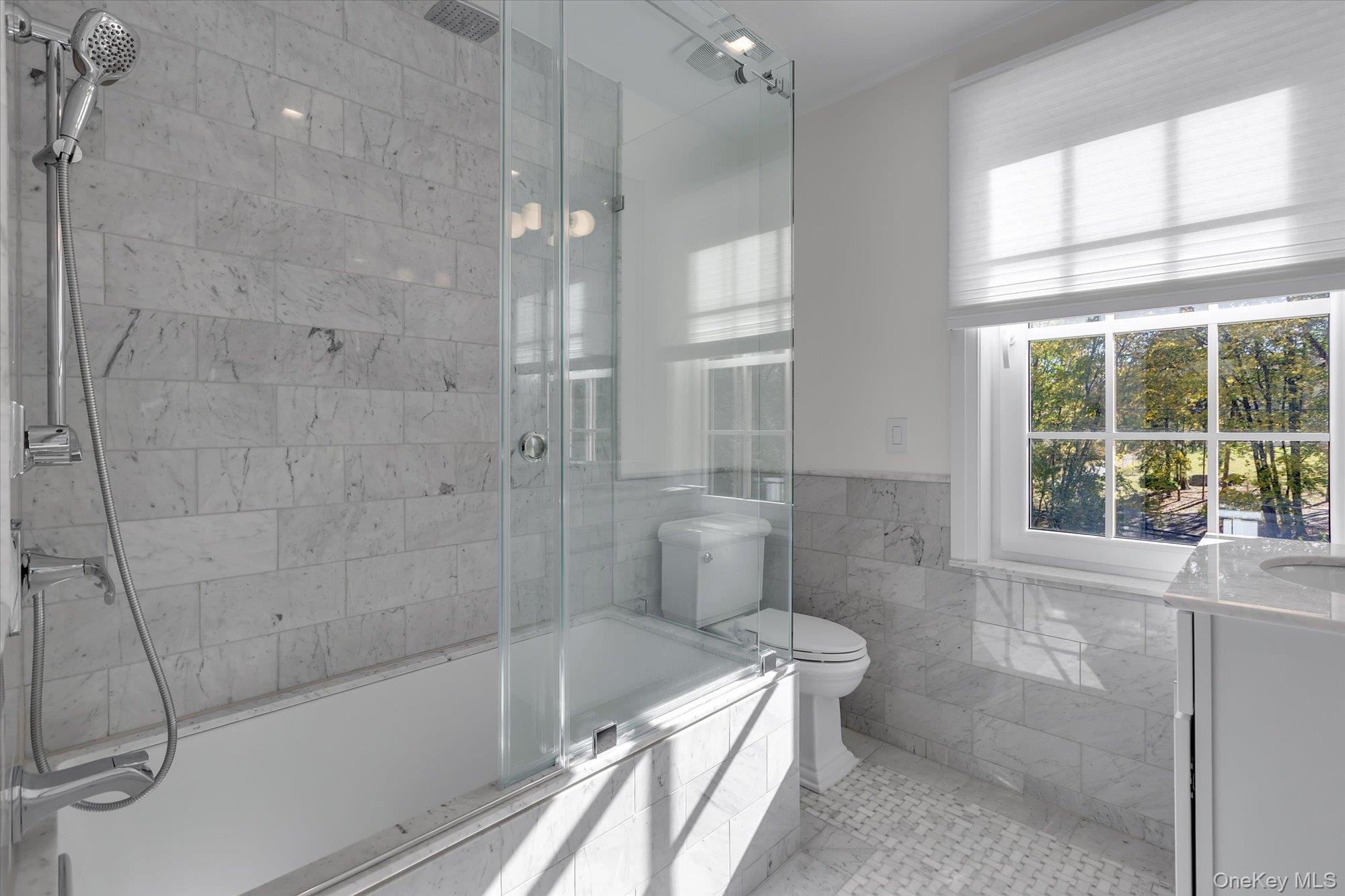 22 Fort Salonga Road Centerport, NY 11721 - Photo 30 of 42 a bathroom with a bathtub and a shower