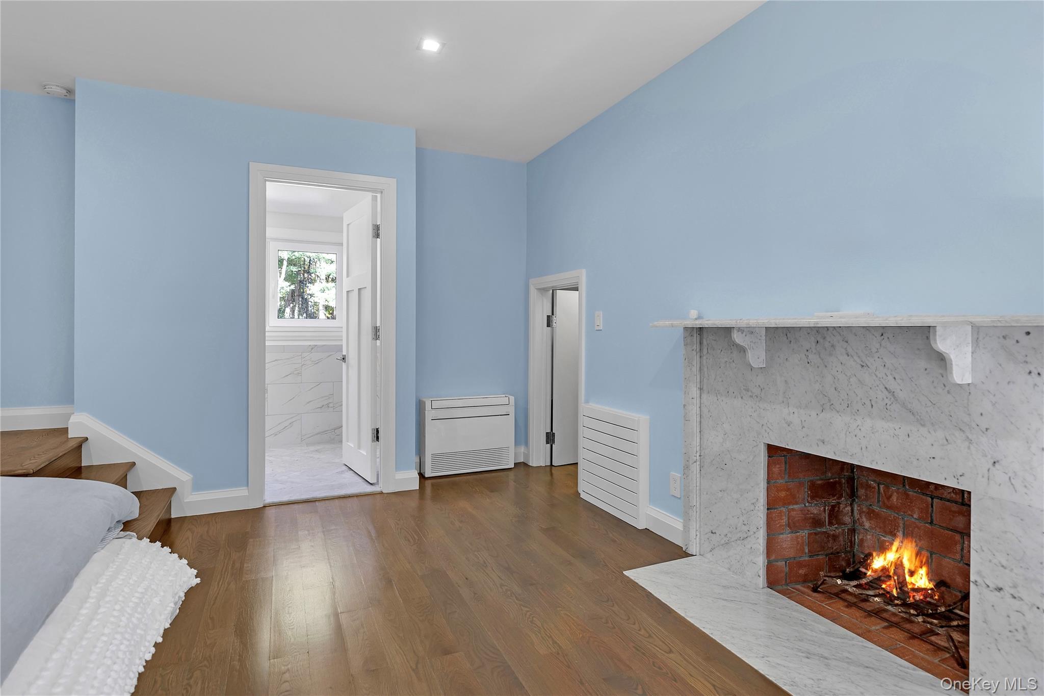 22 Fort Salonga Road Centerport, NY 11721 - Photo 33 of 42 a living room with furniture and a fireplace