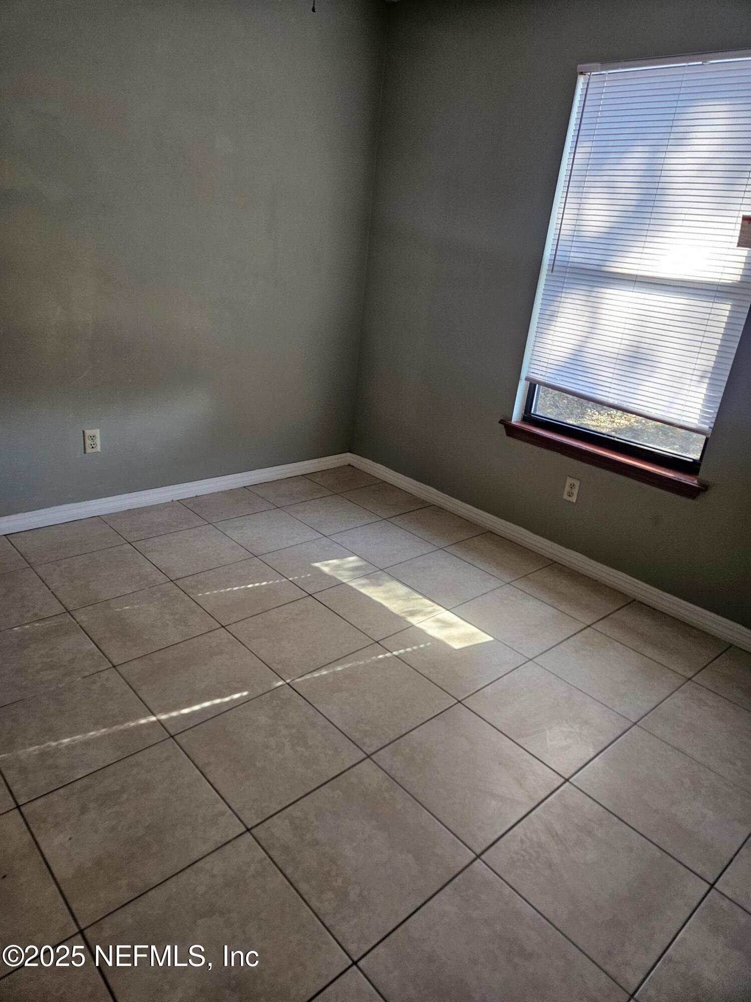 8256 Justin Road North Jacksonville, FL 32210 - Photo 11 of 35 a view of an empty room