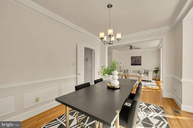 a view of balcony with wooden floor and fence