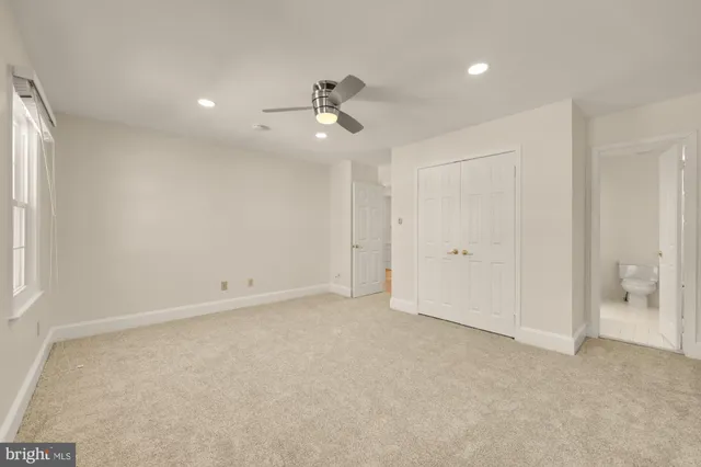 a kitchen with stainless steel appliances granite countertop a sink and a stove