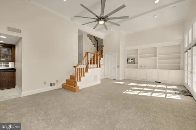 a black and white photo of a living room