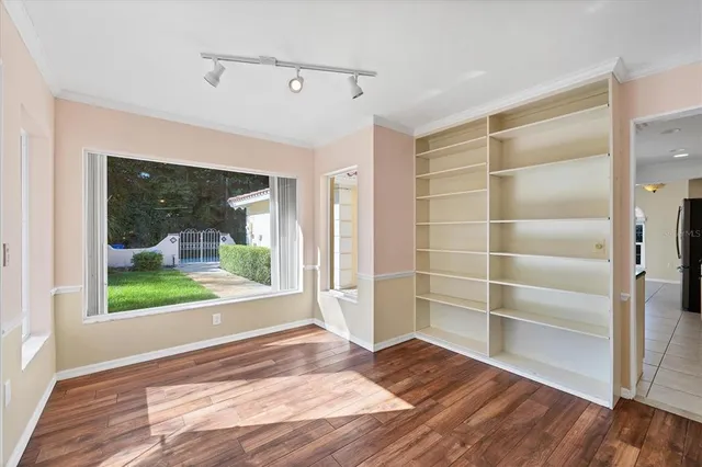 a view of entryway with wooden floor