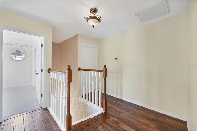 a view of a garden with a house