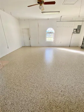 a city street lined with buildings and trees