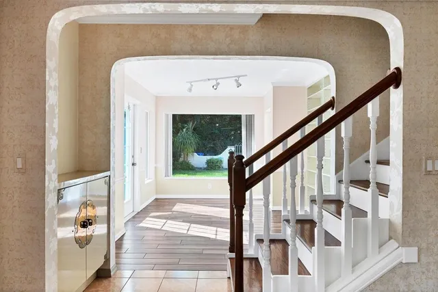 a kitchen with stainless steel appliances granite countertop a sink and cabinets