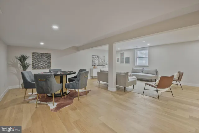 a view of a workspace with furniture and a chair
