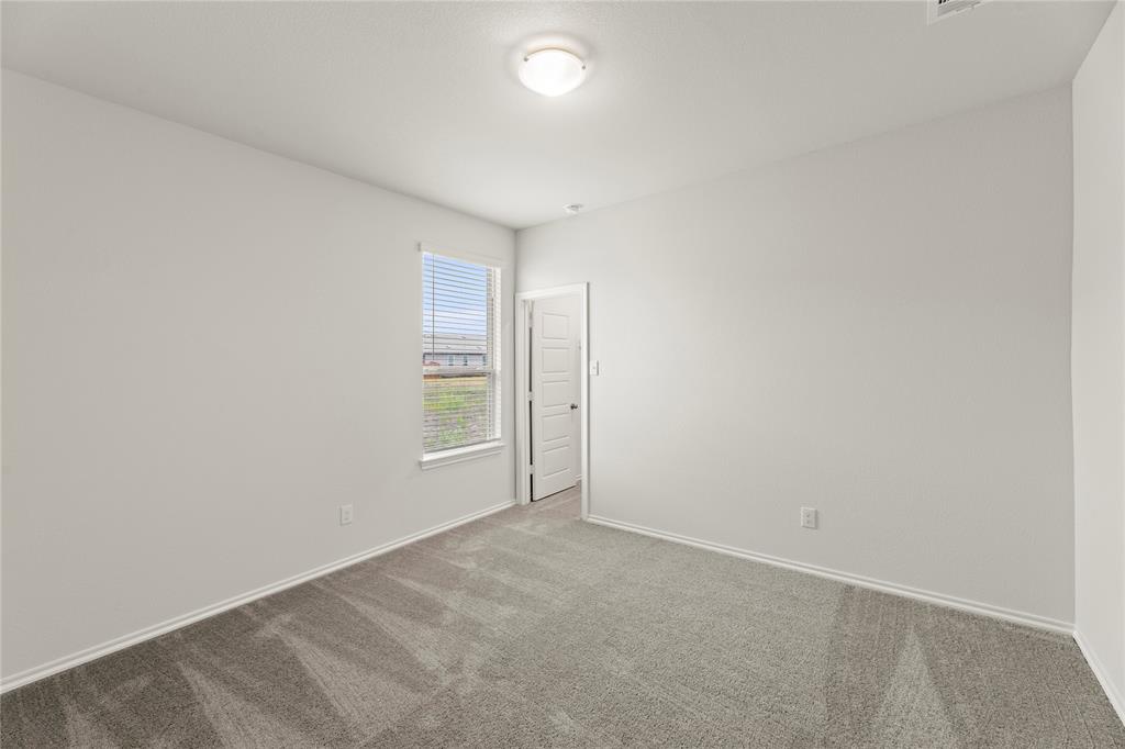 1715 Teton River Drive Blue Ridge, TX 75424 - Photo 10 of 28 an empty room with windows