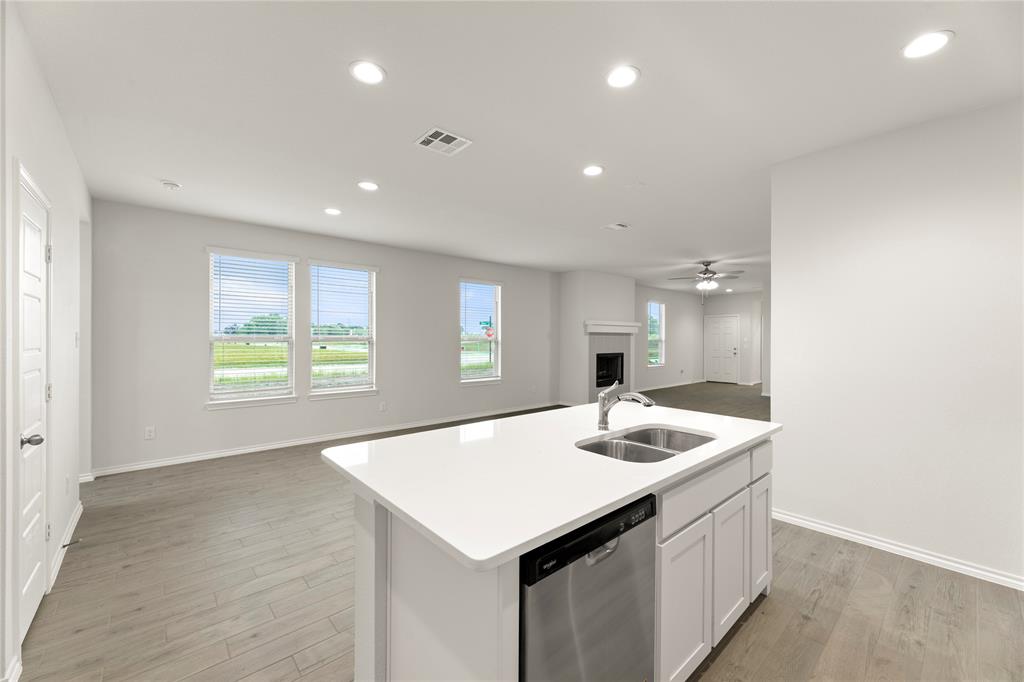 1715 Teton River Drive Blue Ridge, TX 75424 - Photo 17 of 28 a kitchen with a sink cabinets and window