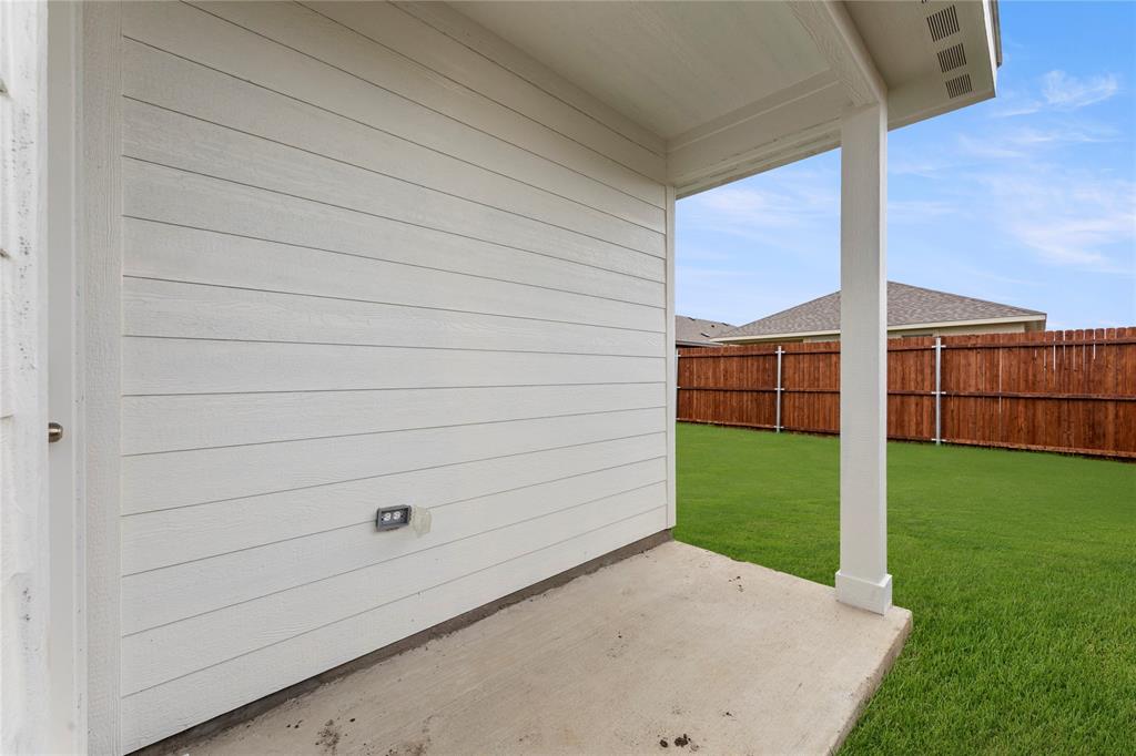 1715 Teton River Drive Blue Ridge, TX 75424 - Photo 25 of 28 a view of a backyard with a garden