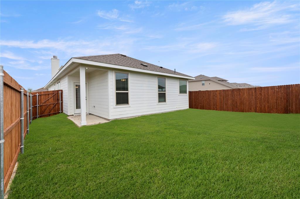 1715 Teton River Drive Blue Ridge, TX 75424 - Photo 27 of 28 a view of a house with a yard