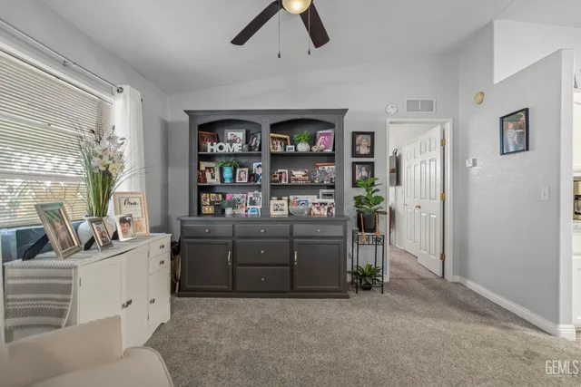 a living room with furniture and window