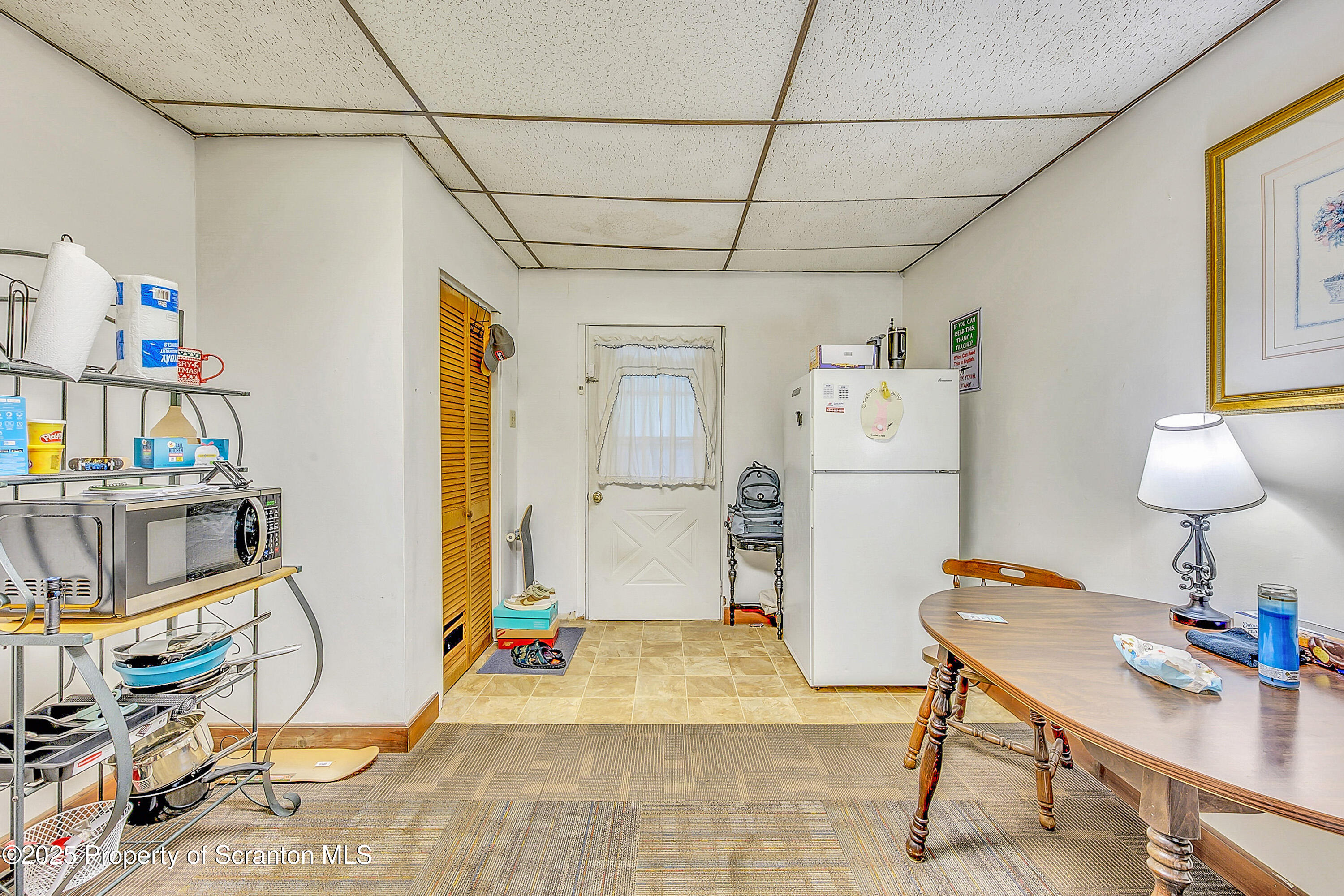 807 Columbus Avenue Blakely, PA 18447 - Photo 15 of 37 a living room with furniture and a table