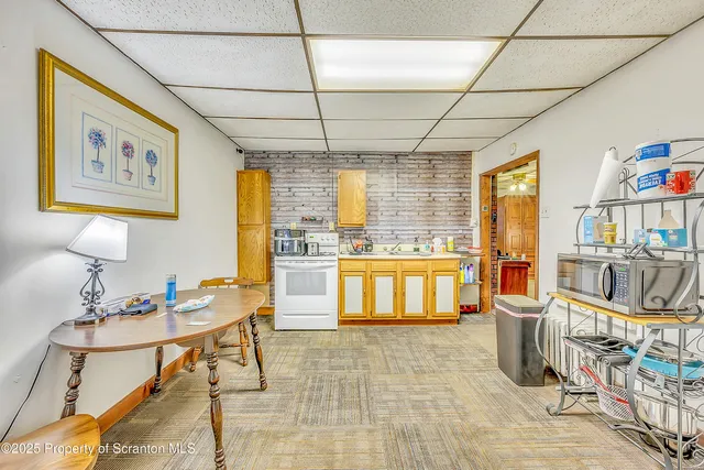 a room with lots of table and chair