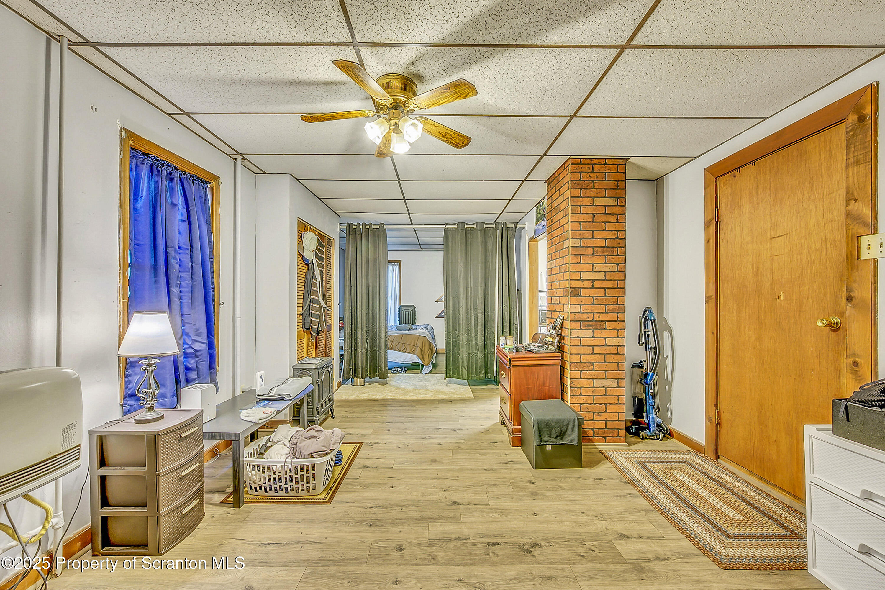 807 Columbus Avenue Blakely, PA 18447 - Photo 22 of 37 a view of a livingroom with couch and windows