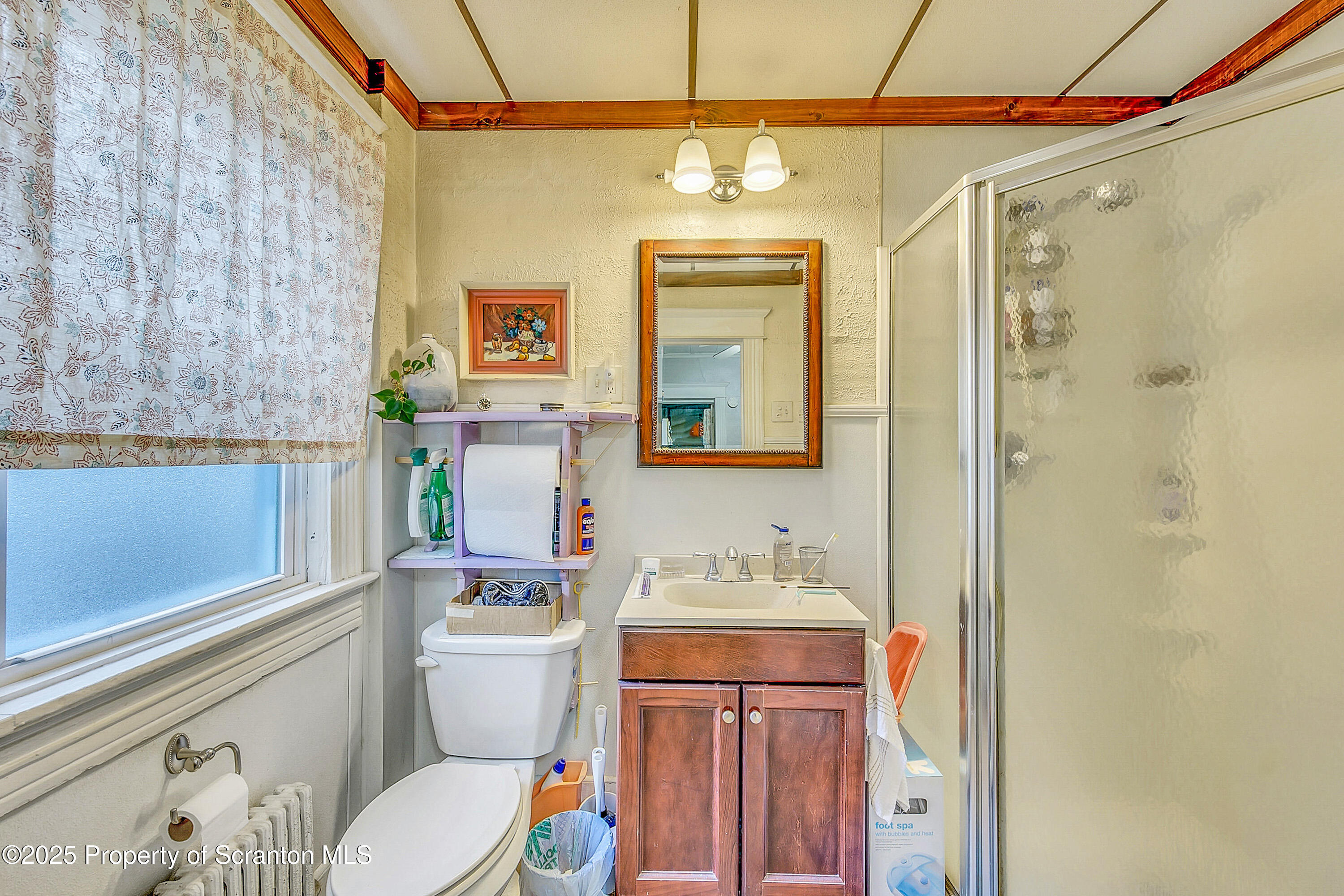 807 Columbus Avenue Blakely, PA 18447 - Photo 24 of 37 a bathroom with a sink a toilet and shower