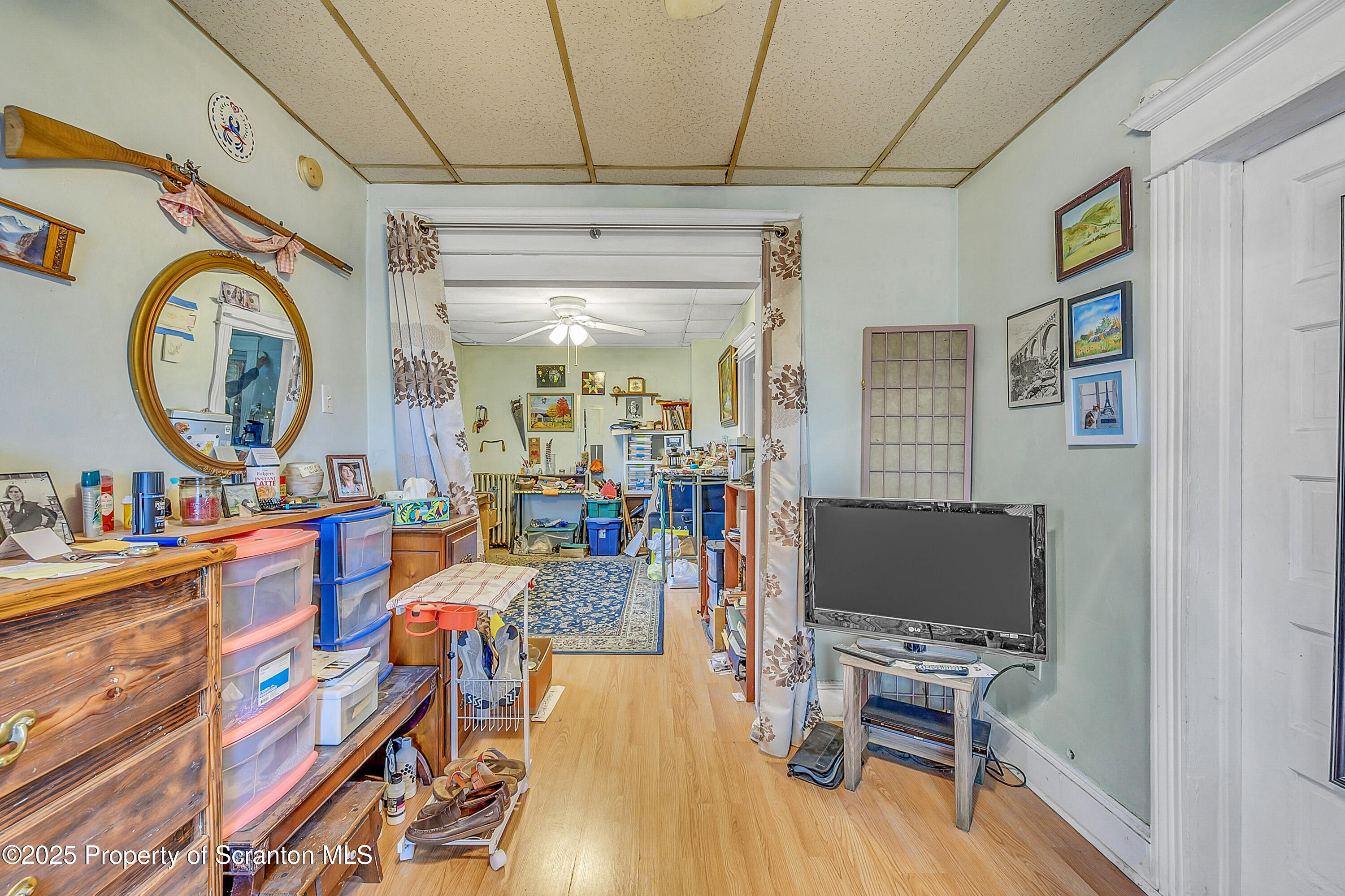 807 Columbus Avenue Blakely, PA 18447 - Photo 35 of 37 a living room with furniture and a flat screen tv