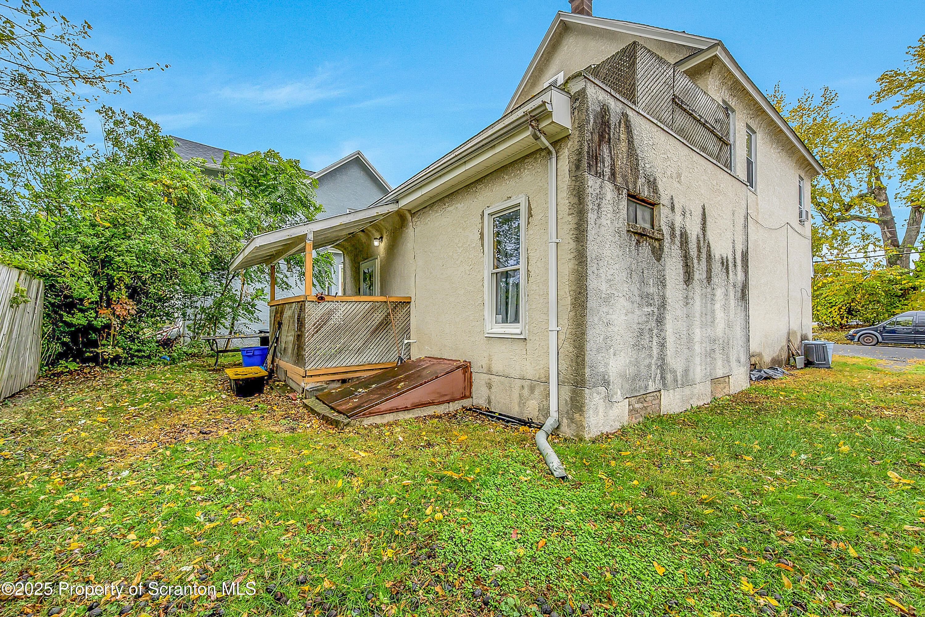 807 Columbus Avenue Blakely, PA 18447 - Photo 5 of 37 a view of a house with backyard and sitting area