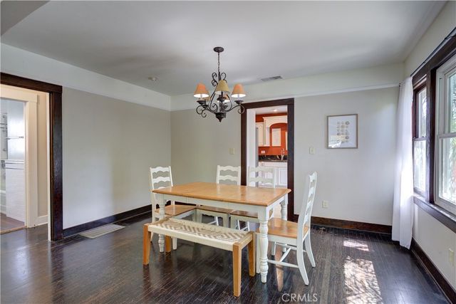a view of a room with furniture window and wooden floor
