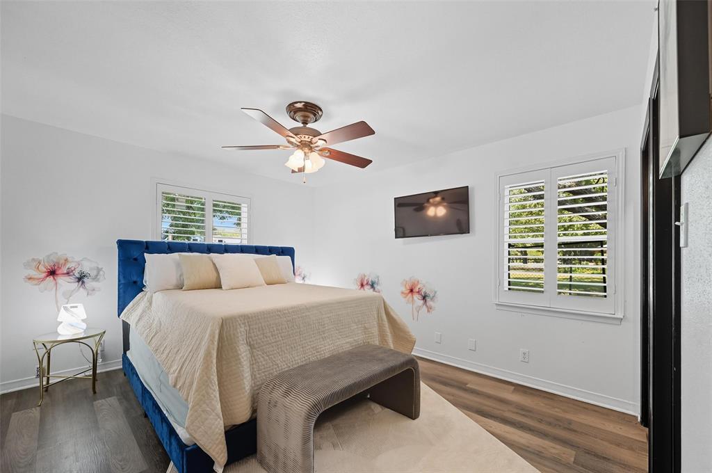 5100 Murphy Road Sachse, TX 75048 - Photo 12 of 38 a bed room with a bed and a window