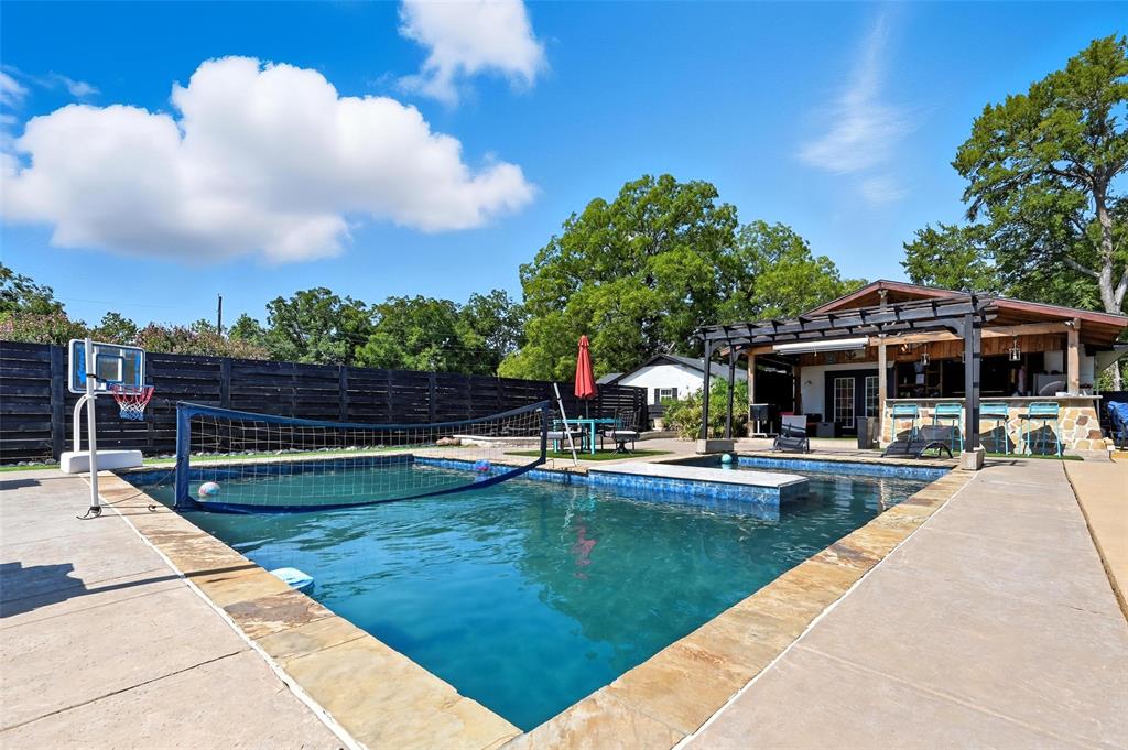 5100 Murphy Road Sachse, TX 75048 - Photo 28 of 38 a view of swimming pool with sitting area