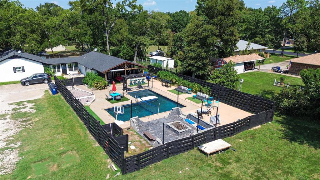5100 Murphy Road Sachse, TX 75048 - Photo 29 of 38 an aerial view of a house having patio with a yard