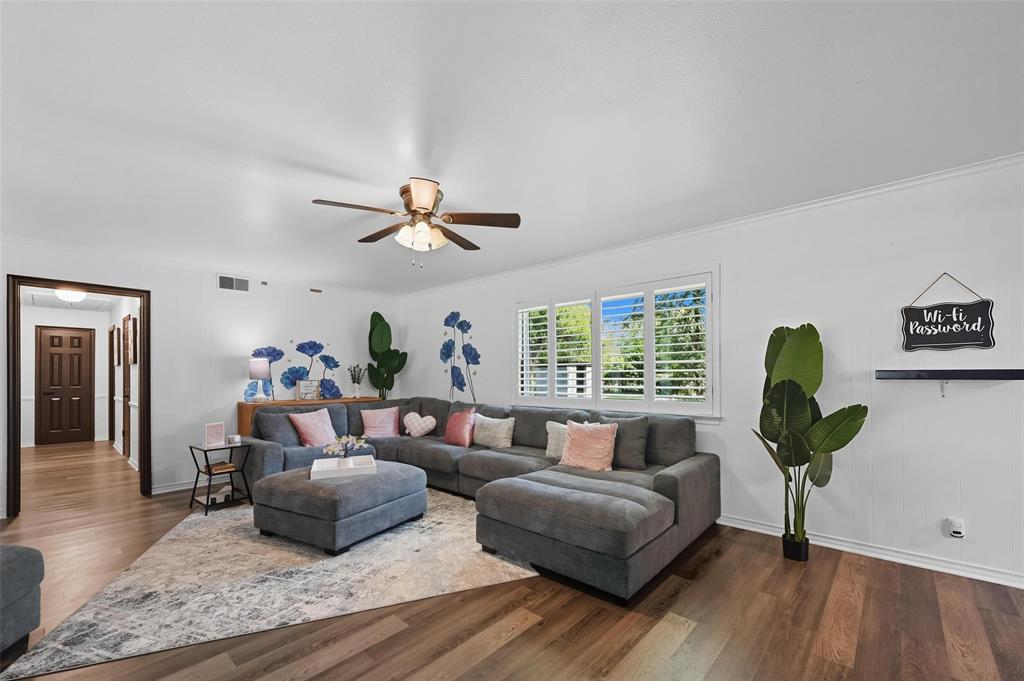 5100 Murphy Road Sachse, TX 75048 - Photo 8 of 38 a living room with furniture and a large window