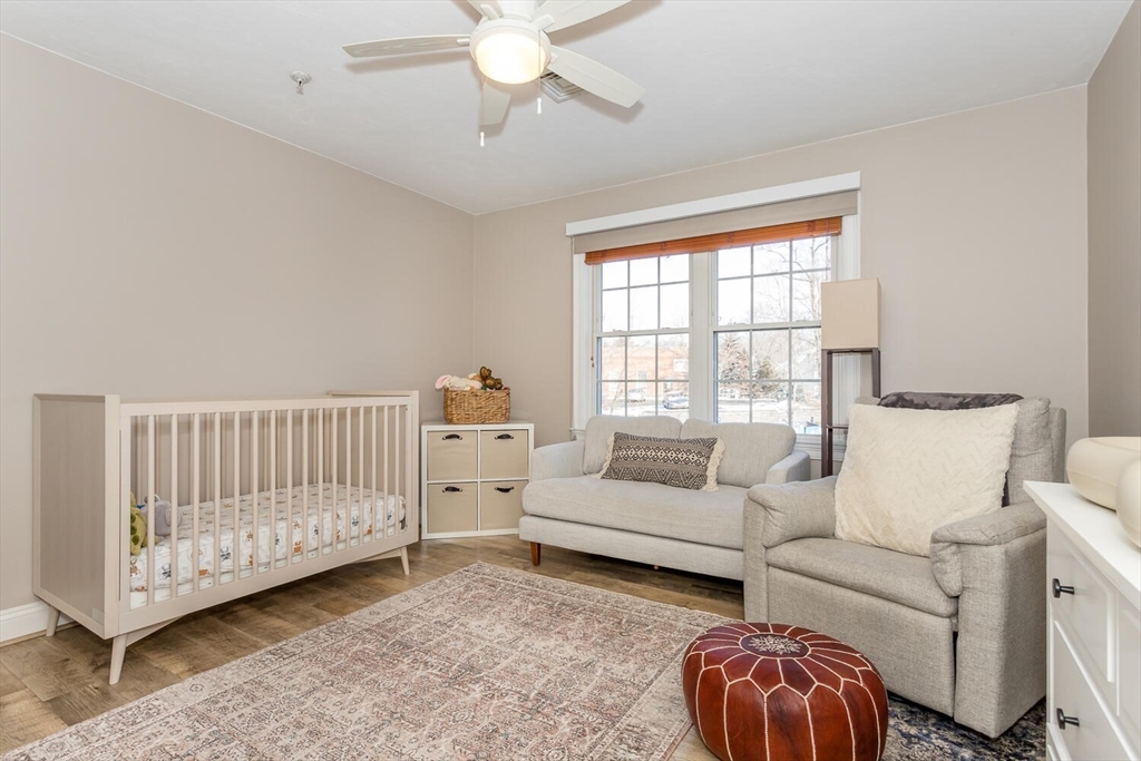 10 Forge Pond, Unit A Canton, MA 02021 - Photo 10 of 17 a living room with furniture and a window