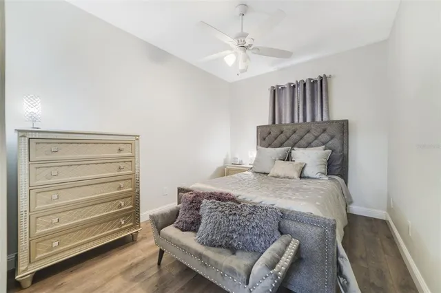 a bedroom with a bed and furniture