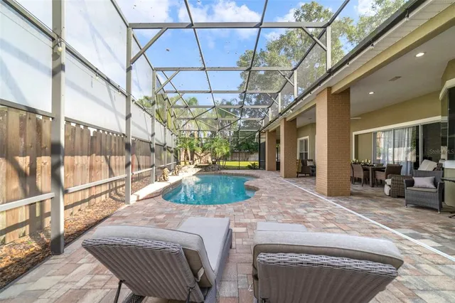 a view of a living room and a chandelier