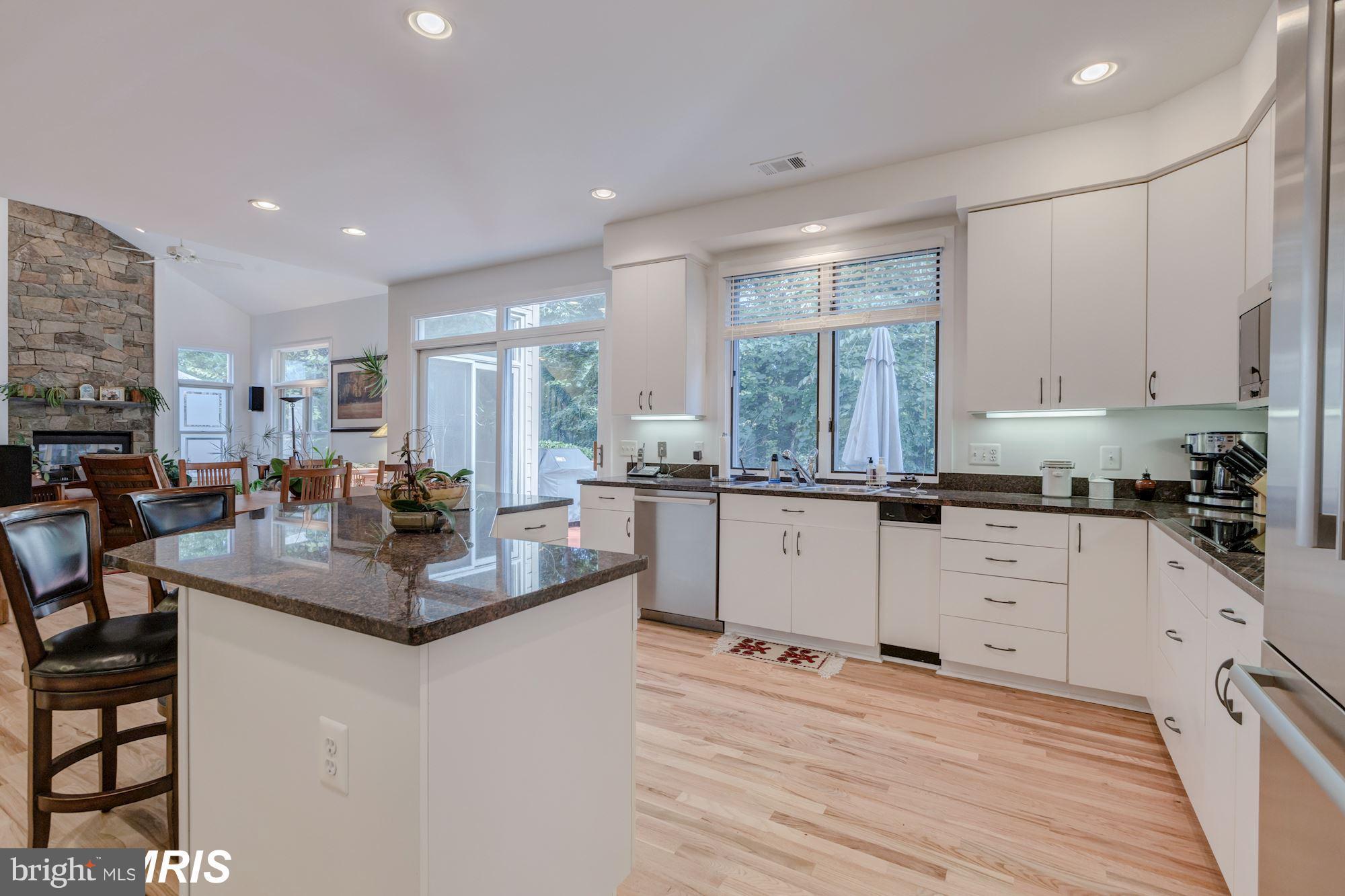 6900 Rannoch Road Bethesda, MD 20817 - Photo 11 of 22 a kitchen with counter top space a sink cabinets and appliances