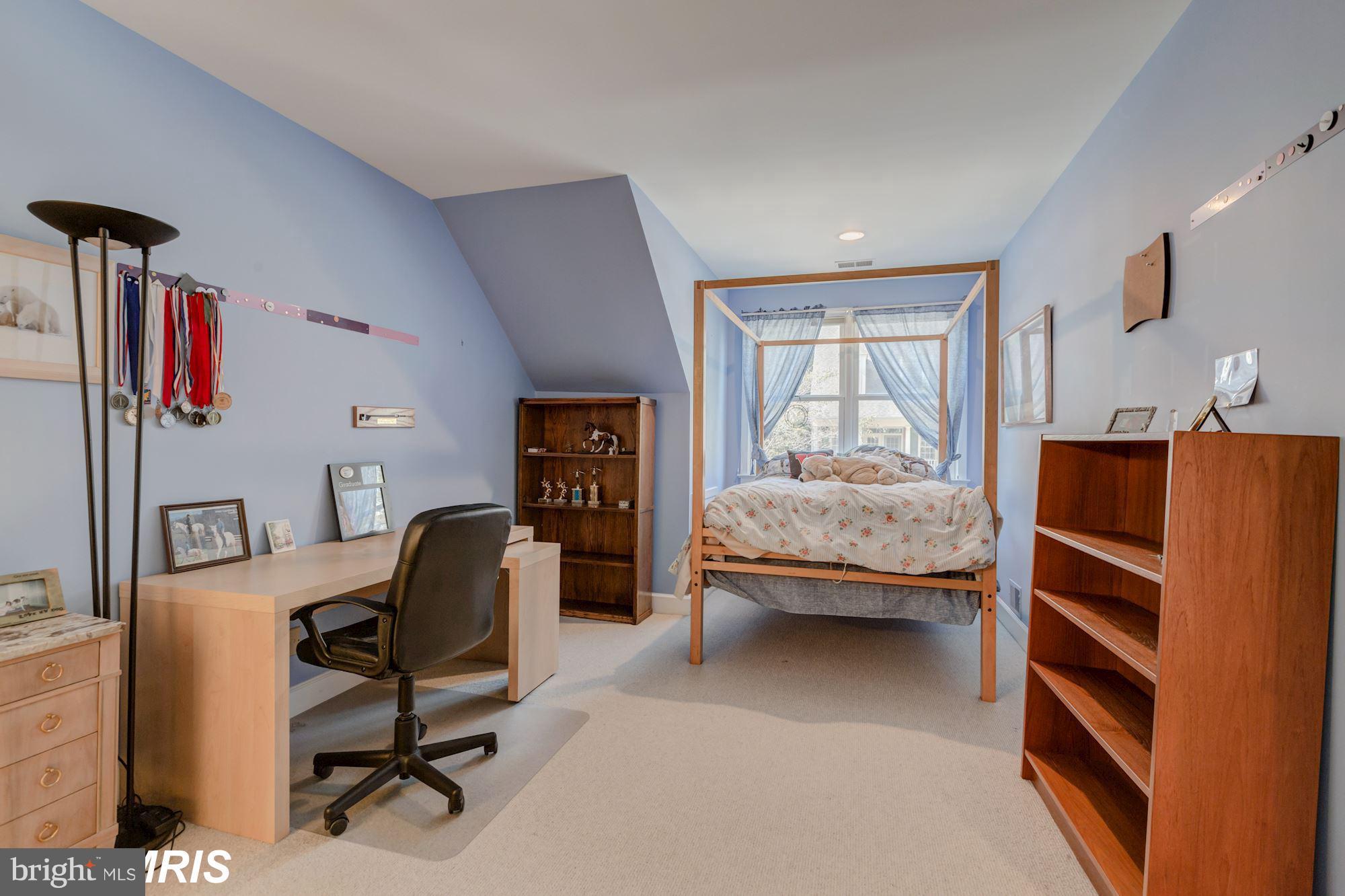 6900 Rannoch Road Bethesda, MD 20817 - Photo 17 of 22 a bedroom with furniture and a window