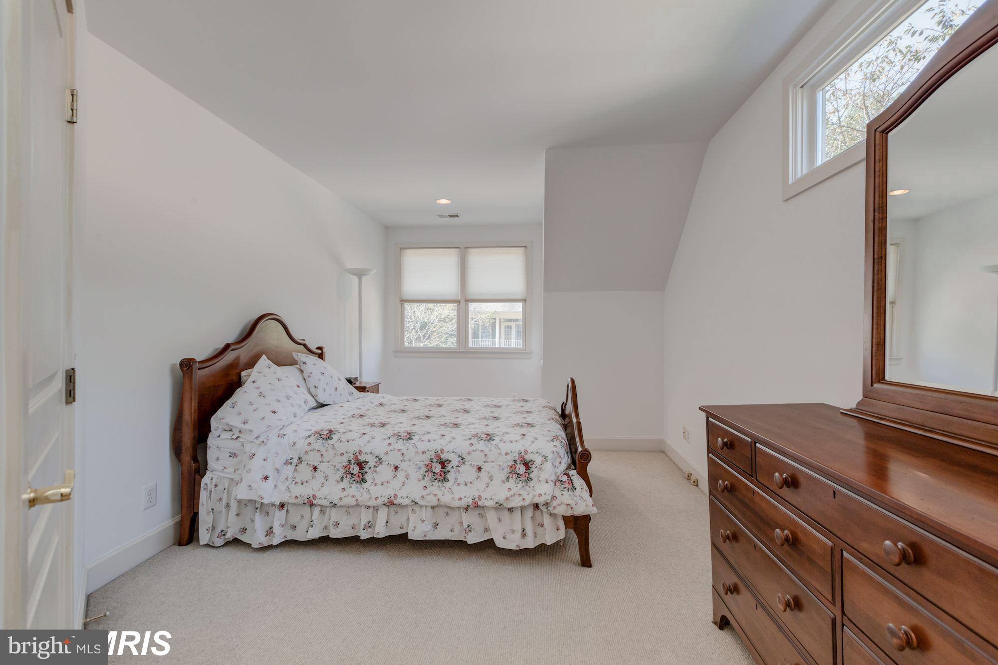 6900 Rannoch Road Bethesda, MD 20817 - Photo 19 of 22 a bedroom with a bed and window