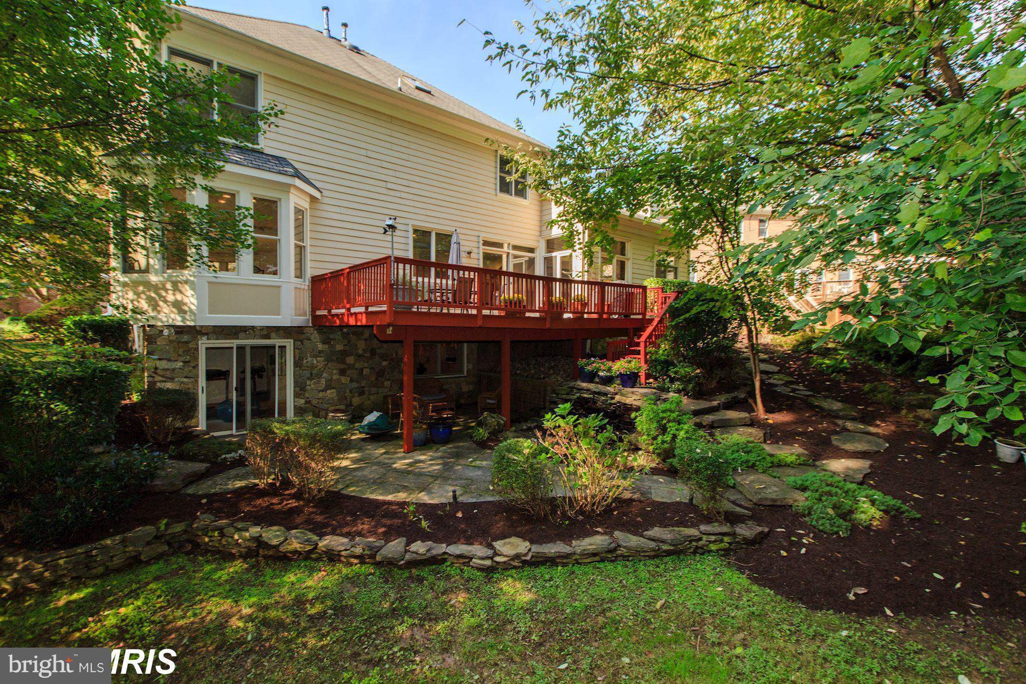 6900 Rannoch Road Bethesda, MD 20817 - Photo 21 of 22 a view of a house with a yard porch and sitting area