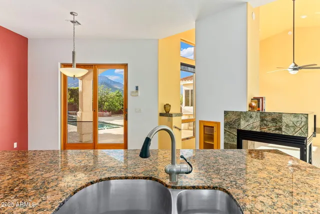 a spacious bathroom with a tub sink and mirror