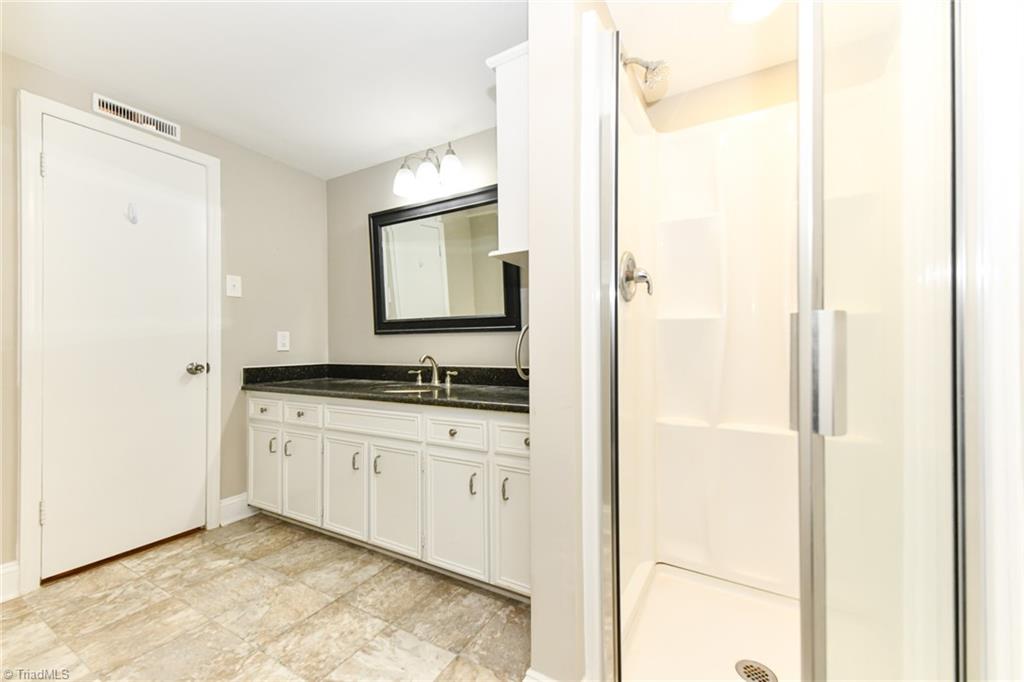 2010 Trosper Road Greensboro, NC 27455 - Photo 18 of 25 Lower level full bathroom