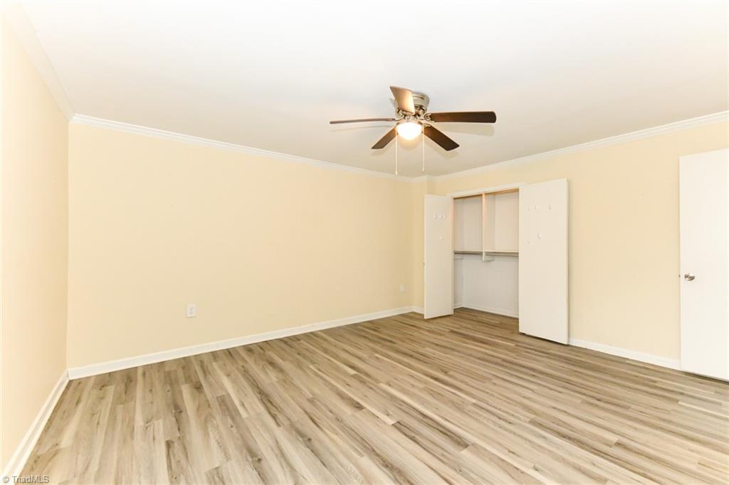 2010 Trosper Road Greensboro, NC 27455 - Photo 19 of 25 Flex room in the lower level. Currently used as another bedroom. It has a window, California closet and entry doorway
