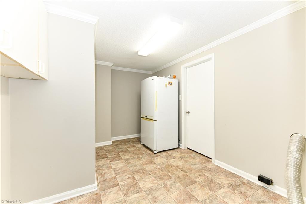 2010 Trosper Road Greensboro, NC 27455 - Photo 20 of 25 Larger Lower level laundry room
