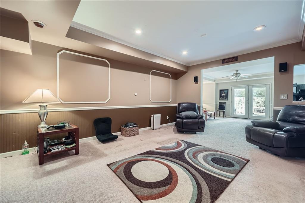 5106 Vining Estates Way Mableton, GA 30126 - Photo 20 of 28 a living room with furniture a fireplace and a lamp