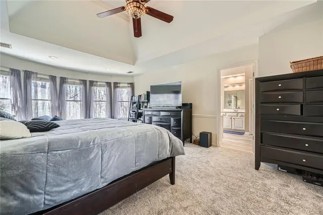 a bedroom with a bed and furniture