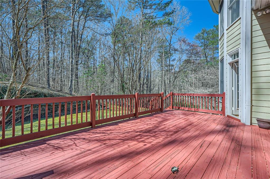 5106 Vining Estates Way Mableton, GA 30126 - Photo 25 of 28 a view of backyard with a deck