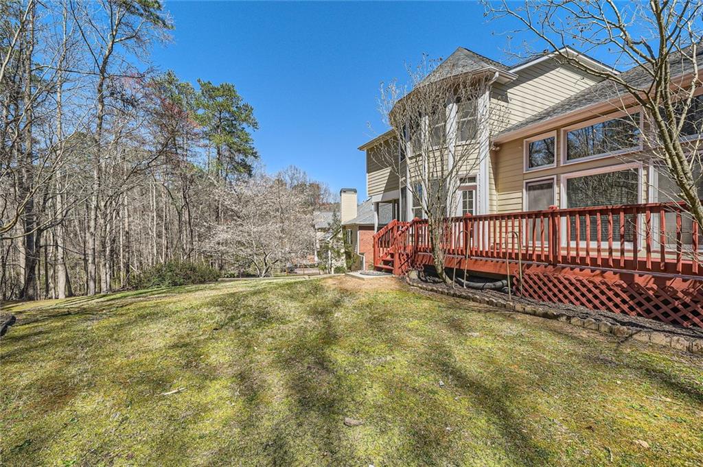 5106 Vining Estates Way Mableton, GA 30126 - Photo 27 of 28 a view of a back yard of the house